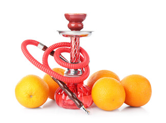 Red traditional hookah and oranges isolated on white