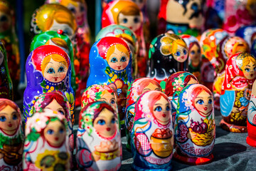 Russian matryoshkas souvenirs stand in a row