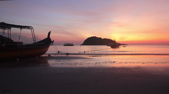 Breathtaking sunrise captured on Redang Island, Malaysia. Radiant sun light and colourful sky, enhancing the natural beauty