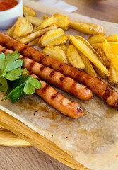 dish of grilled sausage and French fries