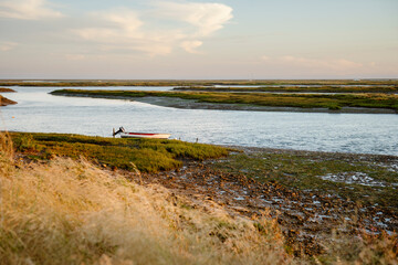 Boats on the water in the beautiful natural park of Ria Formosa., Faro, Portugal