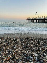 Turkish coast with Mediterranean sea and pebbles