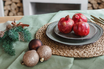 Serving a festive Christmas table in Scandinavian style. Decor on the table before the holiday.