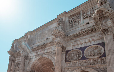 Exploring the Intricate Architecture of a Historical Roman Monument During a Bright Afternoon