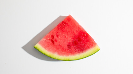 Slice of watermelon glistening under sun, summer solstice celebration treat, refreshing splash in...