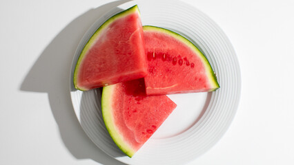 Juicy watermelon slices gleaming like summer's laughter, echoing Midsommar feasts and National Picnic Day freshness with each vibrant bite