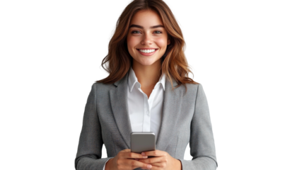 Confident Businesswoman Smiling While Holding Smartphone and Dressed in Professional Attire Against a White Background