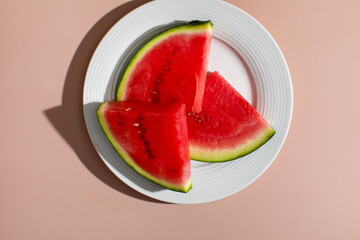Slices of watermelon bask in mellow sunlight, evoking summer picnics and Dubai's annual Fruit...