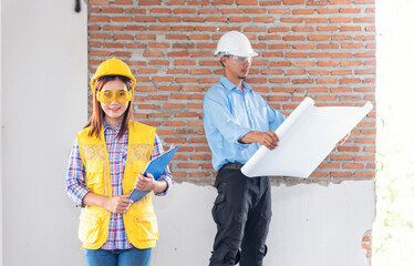 Asian engineer man brainstorming construction building contractor civil worker parners team meeting...