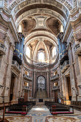 Fototapeta premium Interior of the Mafra National Palace, Convent and Basilica. Baroque architecture at Mafra north of Lisbon in Portugal.
