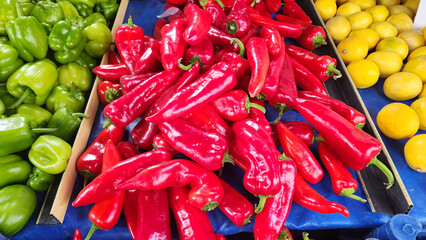 Fruits and vegetables in baskets and crates in the grocery section