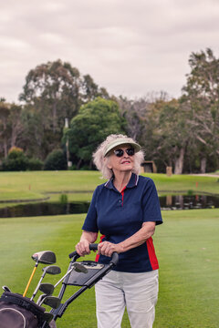 senior woman on golf course