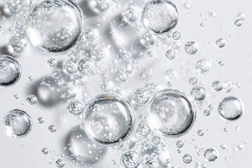 A macro shot of transparent serum bubbles against a white background. Generative AI

