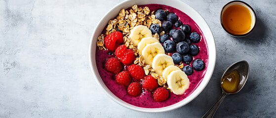 Berry and Granola Smoothie Bowl with Banana Slices