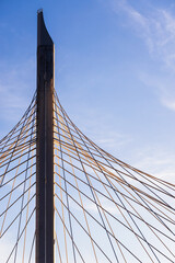 A striking image showcasing the architectural design of a suspension bridge © evannovostro