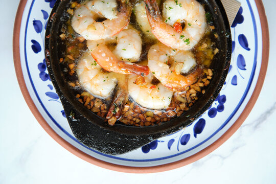 Bowl of shrimps sauteed in butter and garlic