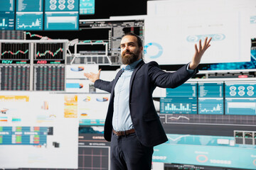 Confident powerful administrator feeling proud of his career success for a high end life and...