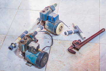 plumber fixing water pipe