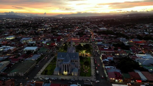 Scenic aerial footage of the sunset fades to night over San Rafael, Heredia, Costa Rica