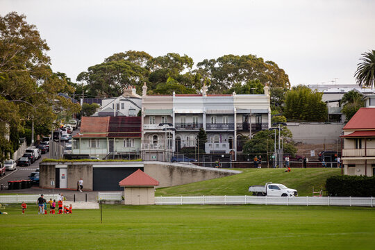 Residential building with row of terrace and balconies.