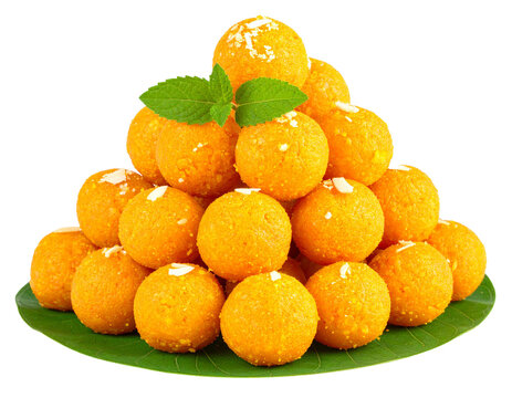 Stack of motichoor laddus with leaf base, isolated PNG &ndash; Indian sweet treat