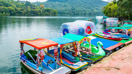 Naukuchiatal is a serene lake town in the Nainital region of Uttarakhand, India famous for water boating.