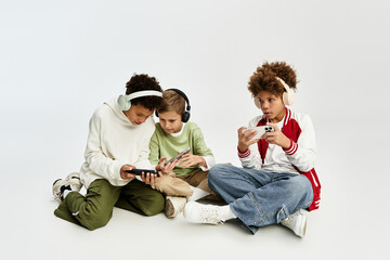 Vibrant friendship shared by boys enjoying gaming together in casual stylish attire