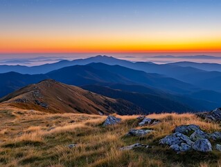 Breathtaking Sunrise Over Rolling Mountains and Vast Horizon