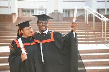 Happy African American students on their graduation day