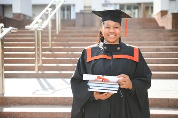 Excited African American woman at her graduation