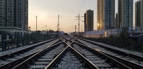 Complex Railway Structure at Sunset