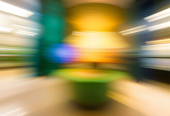 グラデーションエッジ付きのおしゃれなオフィスシーンなどにモーションブラー効果を付けた背景。ビジネスプレゼンなどの用途に