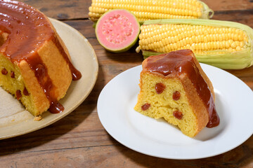Delicious slice of Brazilian corn cake with guava and corn on the cob