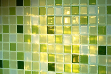 Green Glass Tile Mosaic Close Up. Abstract Square Wall Texture With Natural Light.
