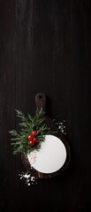 Elegant Wooden Board with Holiday Greens and Red Berries Top View