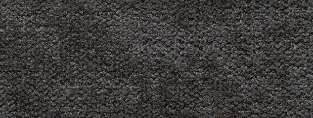 Dark gray fluffy textile background with macro texture and black soft looped surface for cozy...
