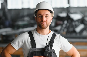 portrait of a confident worker in a factory