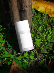 skincare bottle with plain white label on the natural woods background