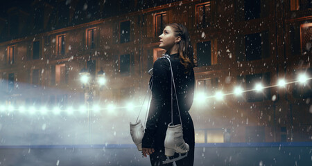 Figure skater woman skating on winter skating ice.