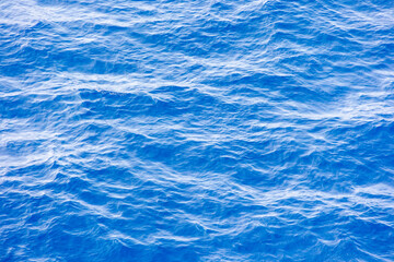 Vibrant blue ocean surface with sunlight reflections Italy, Bastia, 10.6.2025