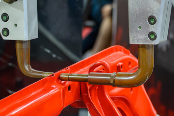 The automotive parts assembly line by tig welding robot.