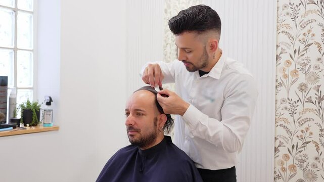 Hair transplant surgery involves implanting hair follicles extracted from a donor area into a recipient area experiencing hair loss