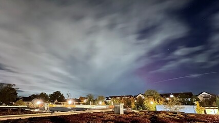 Northern lights over Munich due to an extreme geomagnetic storm on the night of October 10th to...