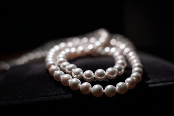 Exquisite pearls displayed elegantly on a velvet background enhancing their luster and timeless beauty