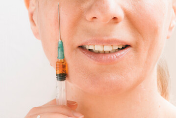 Cosmetic procedure with anti-wrinkle injections for rejuvenation, for healthy skin, in a clinic to preserve youth.