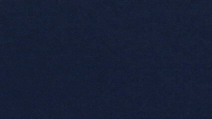 A detailed close up macro shot showcasing the textured surface of a dark navy blue fabric with a subtle woven pattern and a matte finish