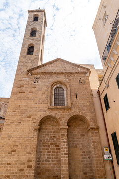 Historic church facade with bell tower in Taranto