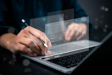 User interacts with AI chatbot interface on laptop, symbolizing future of communication, digital...