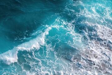 Pure blue turquoise water texture of the ocean sea with foam from and waves. MZ 