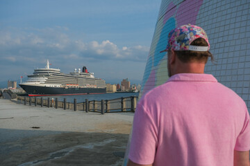Classic ocean liner cruiseship cruise ship Elizabeth in port of Aomori, Japan with skyscraper...